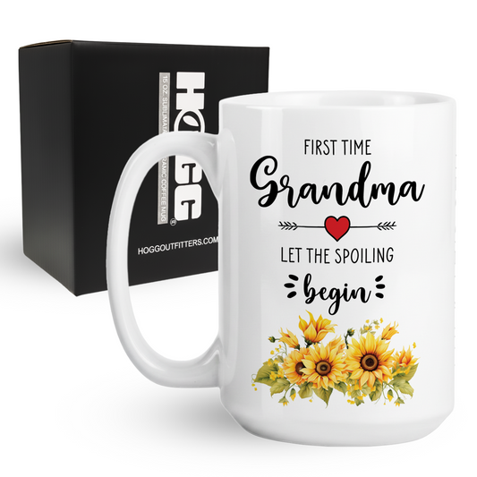 15oz coffee mug featuring a yellow floral First Time Grandma design next to its gift box