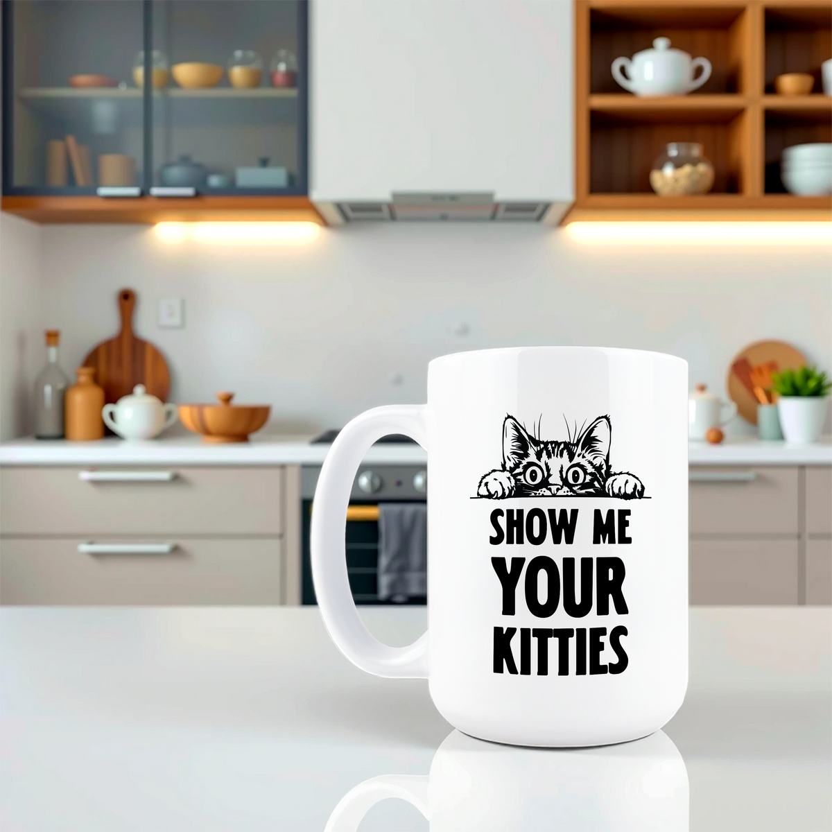 Lifestyle shot of peeking cat and Show Me Your Kitties text mug on a kitchen counter