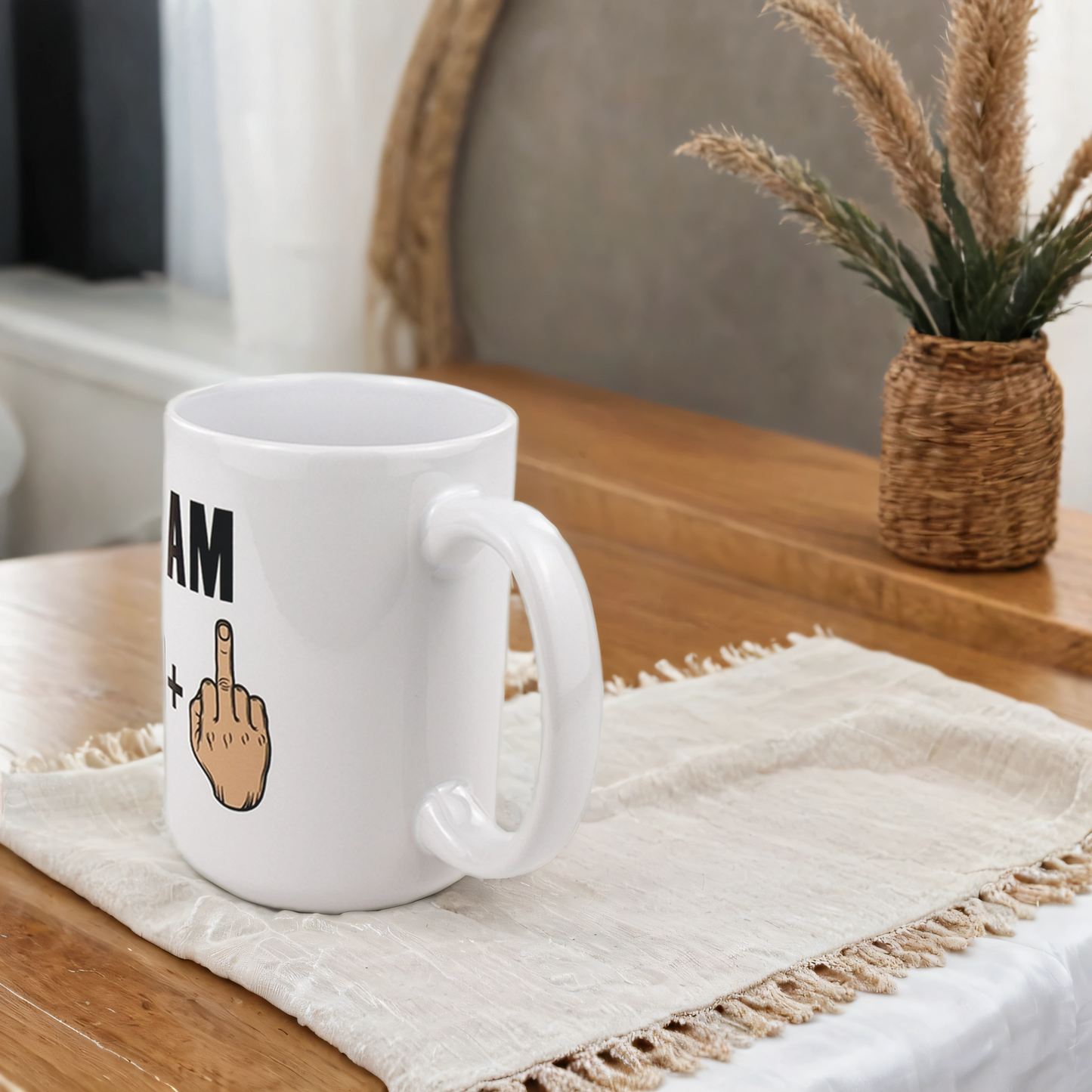 White mug with a graphic design on a wooden surface