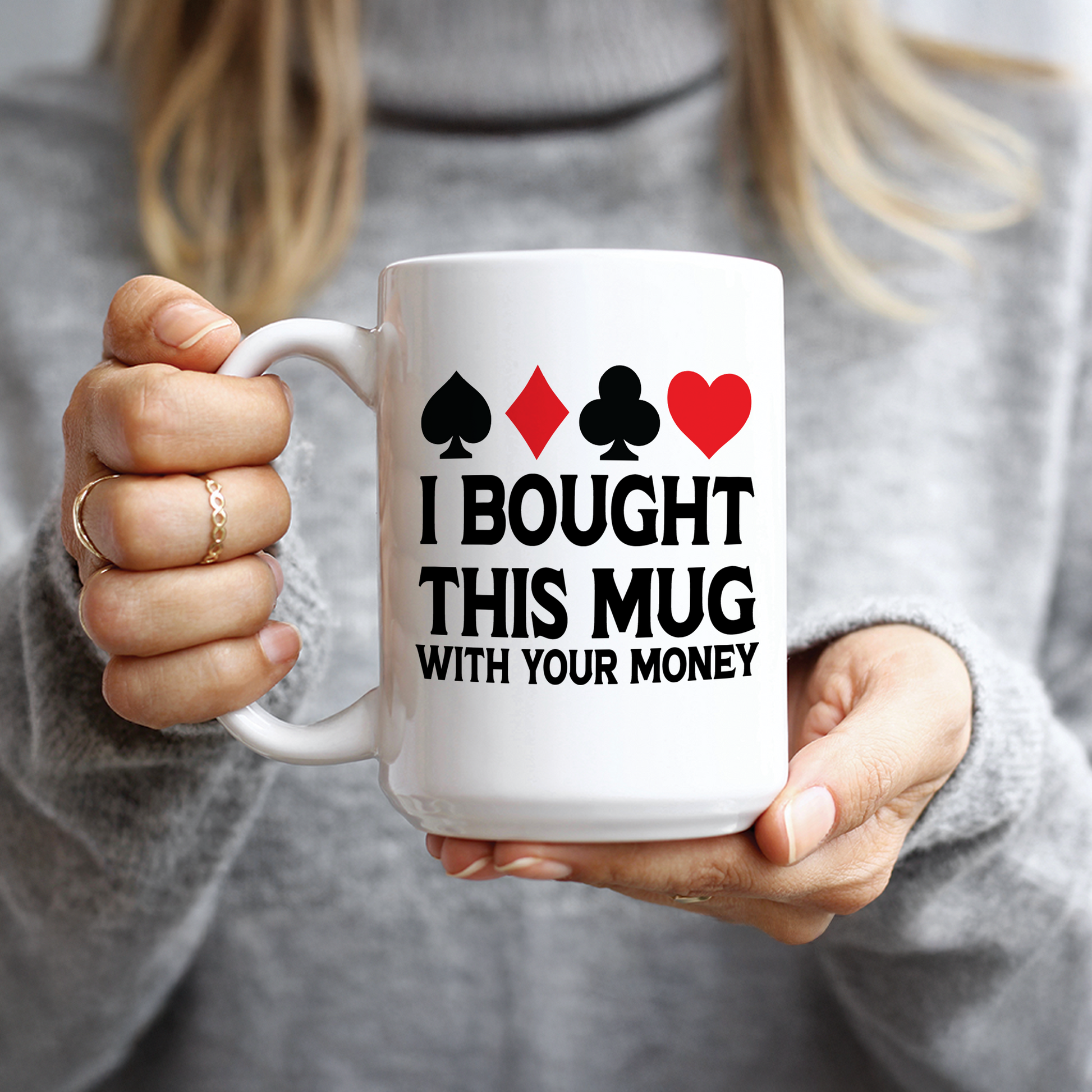 Hand holding 15oz mug with funny poker trash talk design