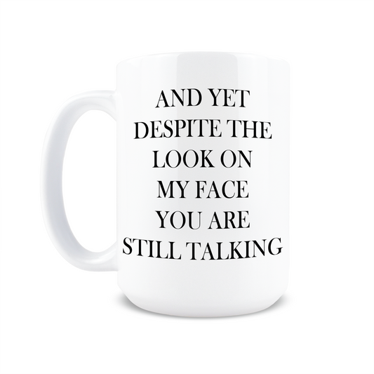 And Yet Despite the Look on My Face Coffee Mug